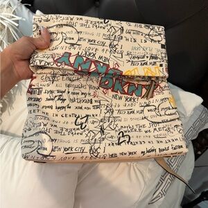 DKNY Cream Graffiti Fold-Over Clutch with Multicolor Accent